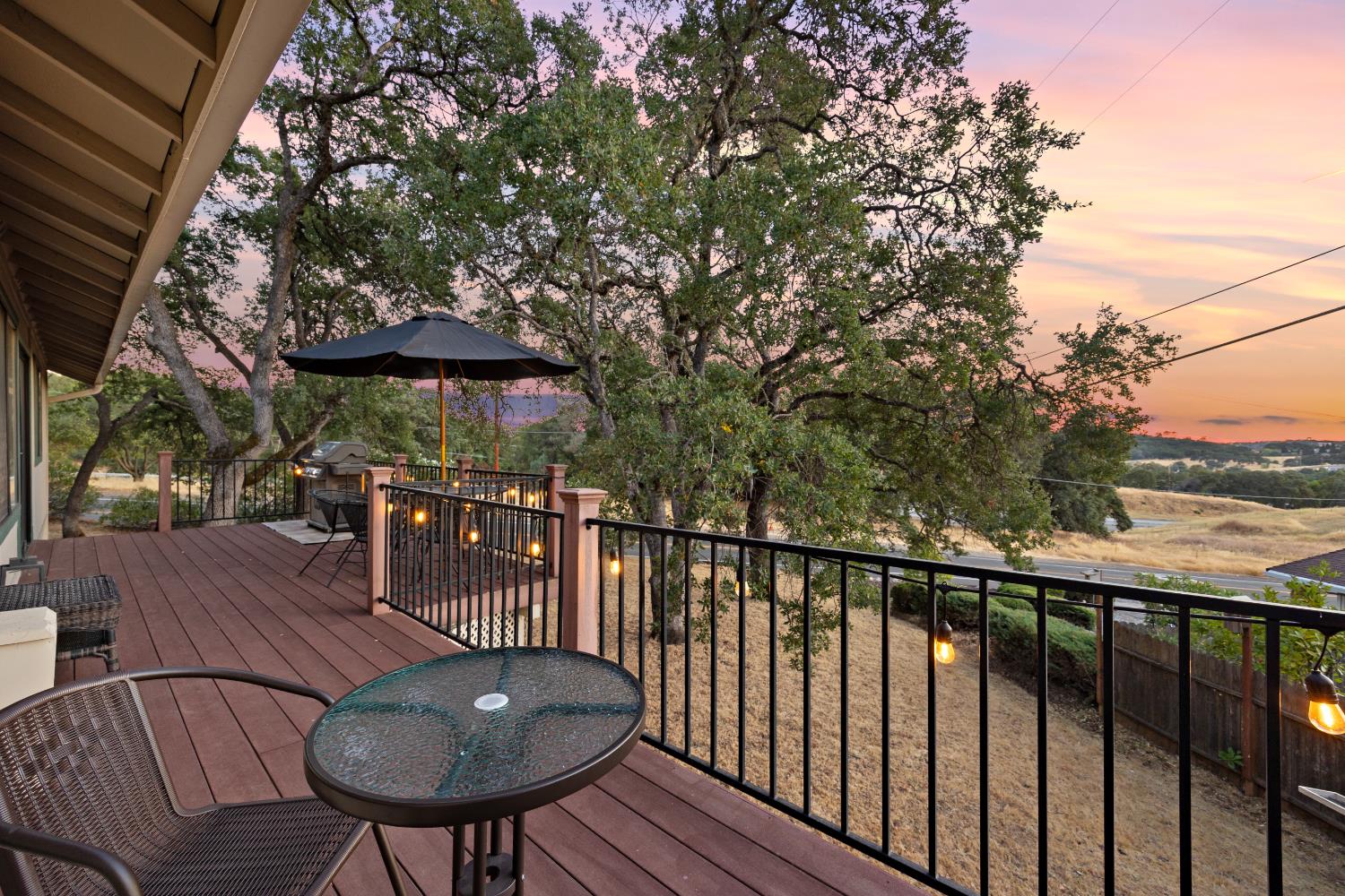 3980 Rustic Road Cameron Park, CA 95682 - Photo 26 of 42 a view of a chairs and table in the balcony