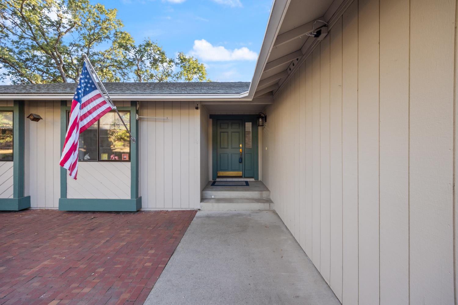3980 Rustic Road Cameron Park, CA 95682 - Photo 34 of 42 a view of a entrance gate of the house