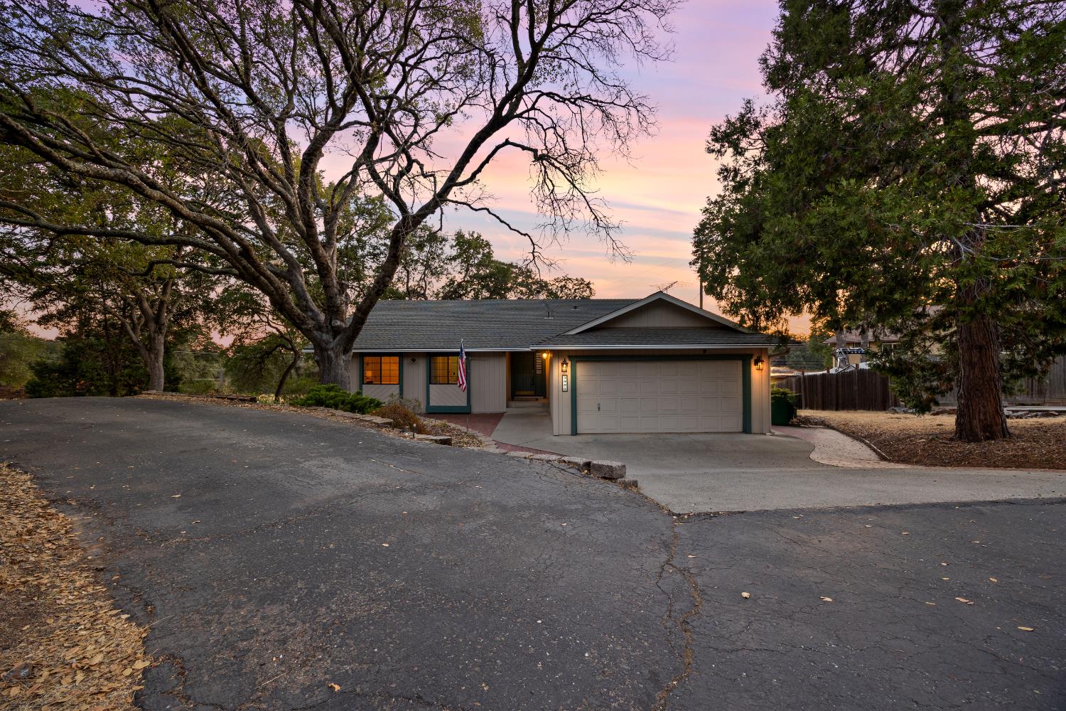 3980 Rustic Road Cameron Park, CA 95682 - Photo 4 of 42 a view of a house with a yard