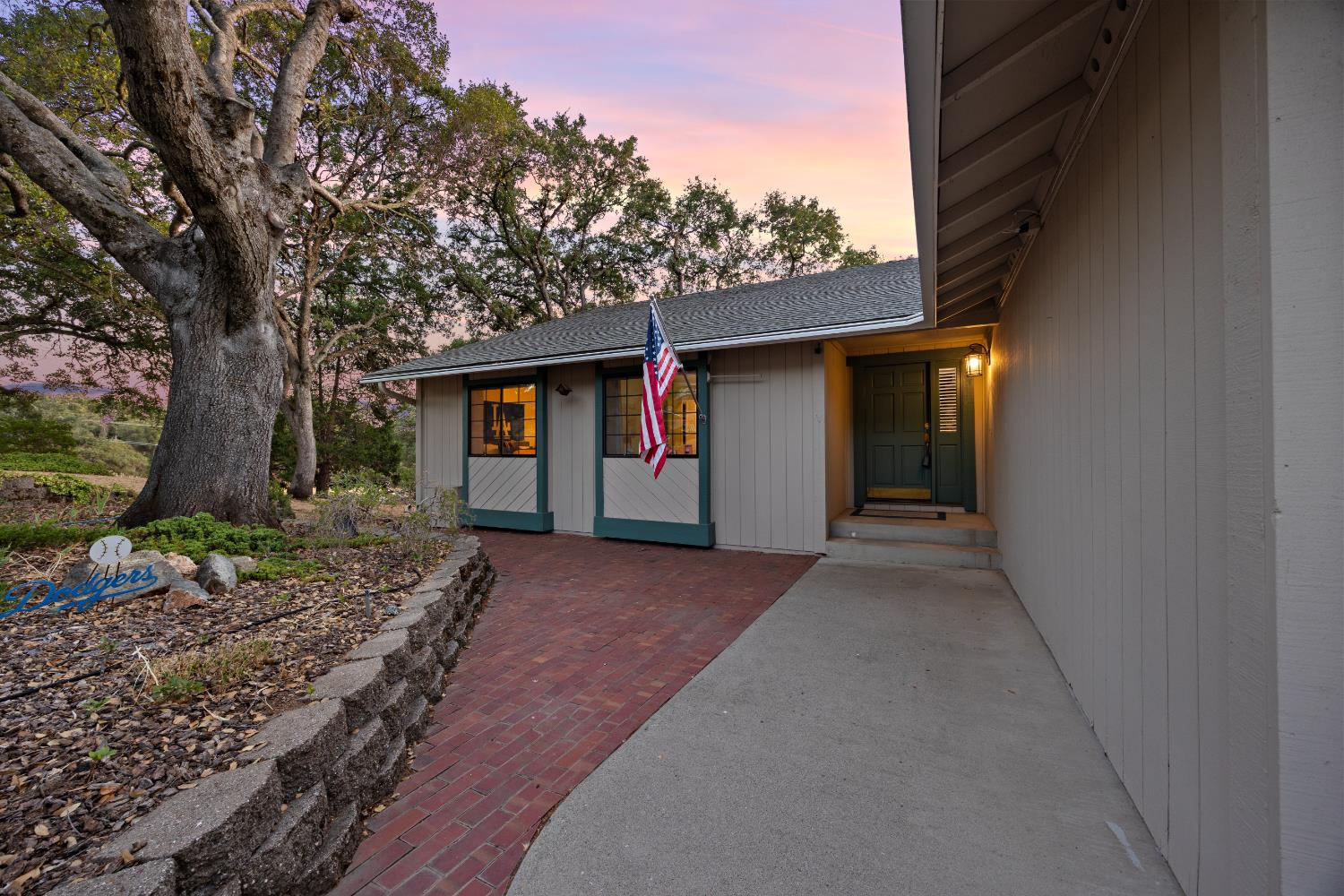 3980 Rustic Road Cameron Park, CA 95682 - Photo 6 of 42 a view of a house with a backyard and tree