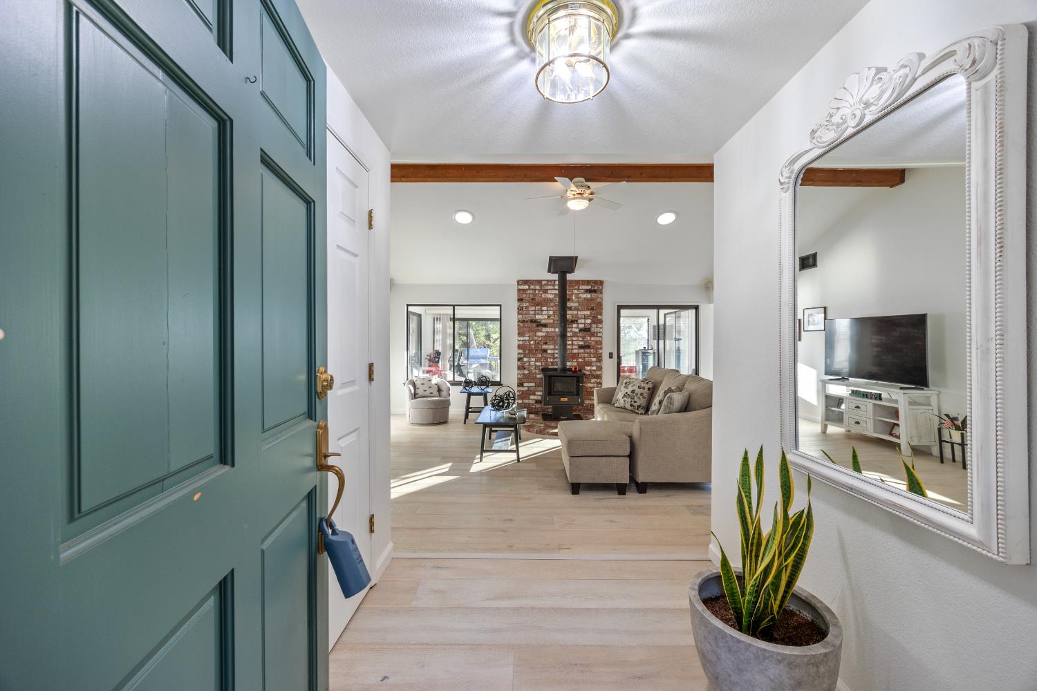 3980 Rustic Road Cameron Park, CA 95682 - Photo 7 of 42 a living room with furniture and a large window