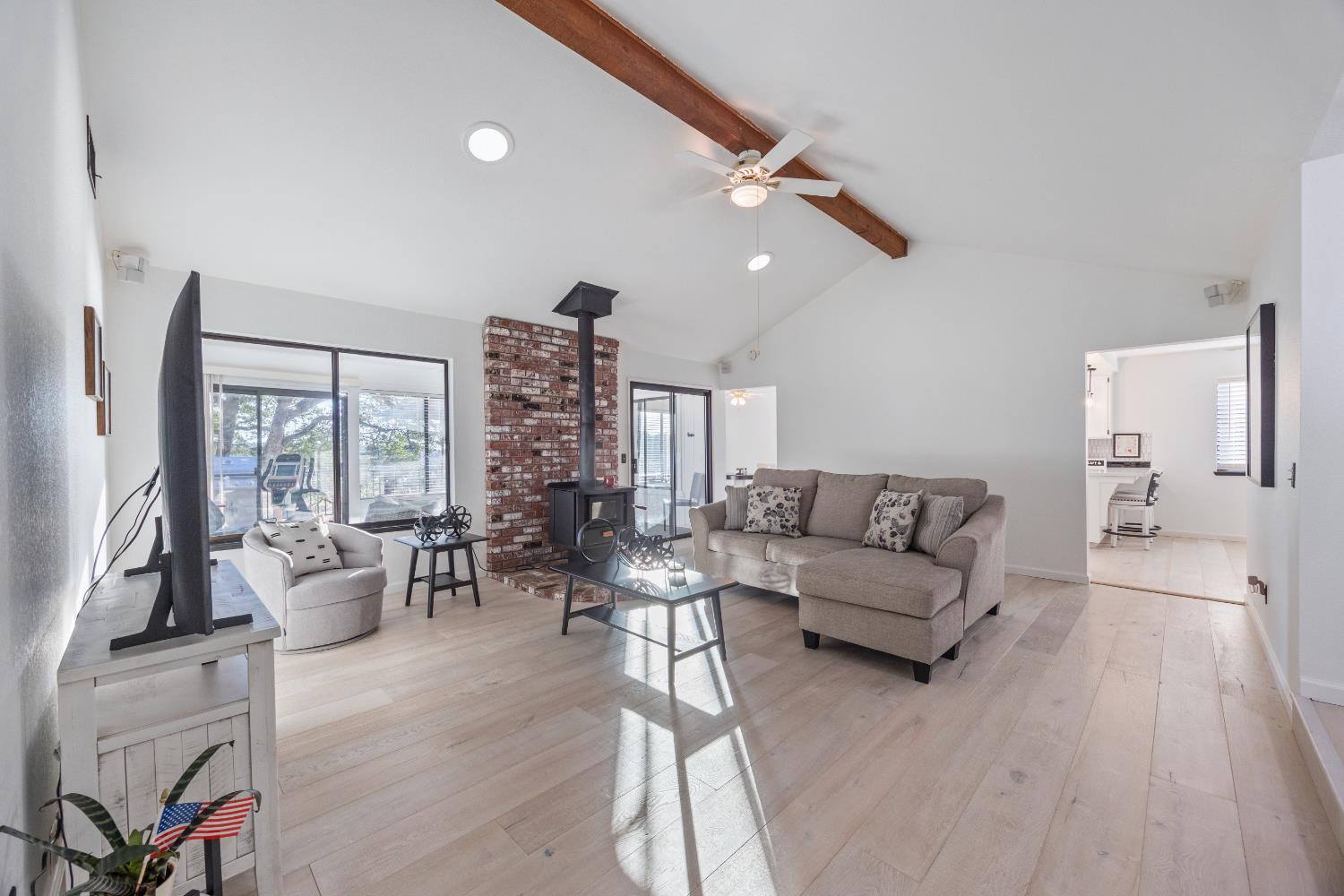 3980 Rustic Road Cameron Park, CA 95682 - Photo 8 of 42 a living room with furniture and a large window