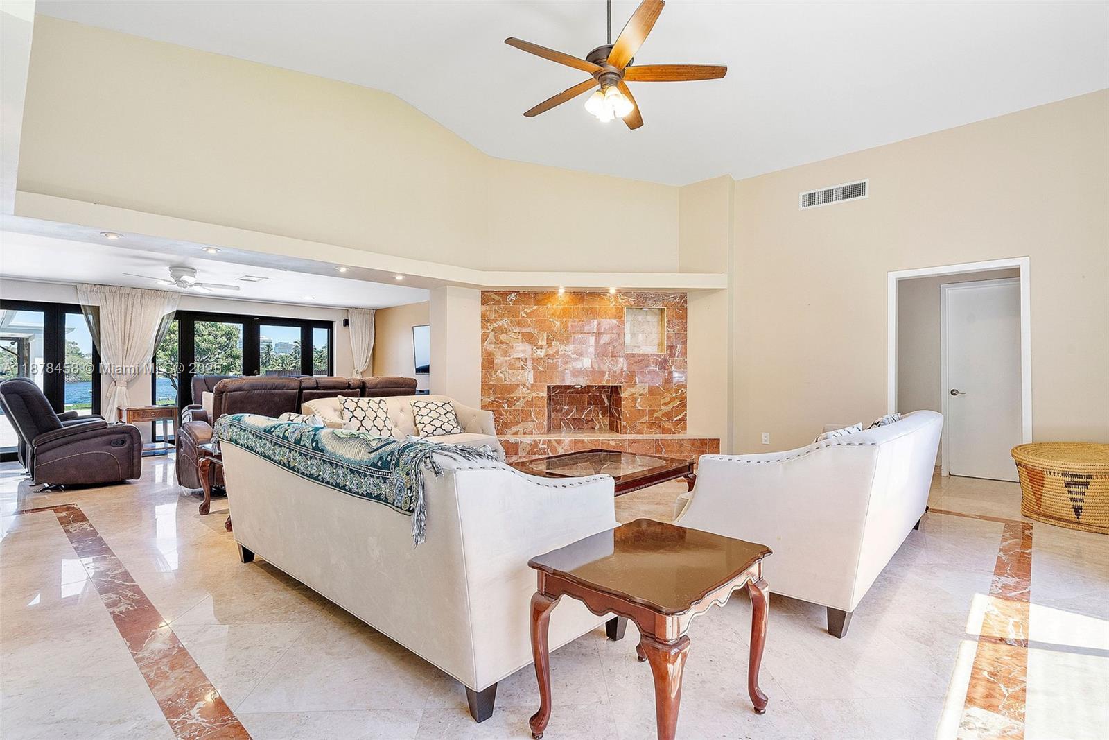2531 Northeast 195th Street Aventura, FL 33180 - Photo 11 of 45 a living room with furniture and a large window
