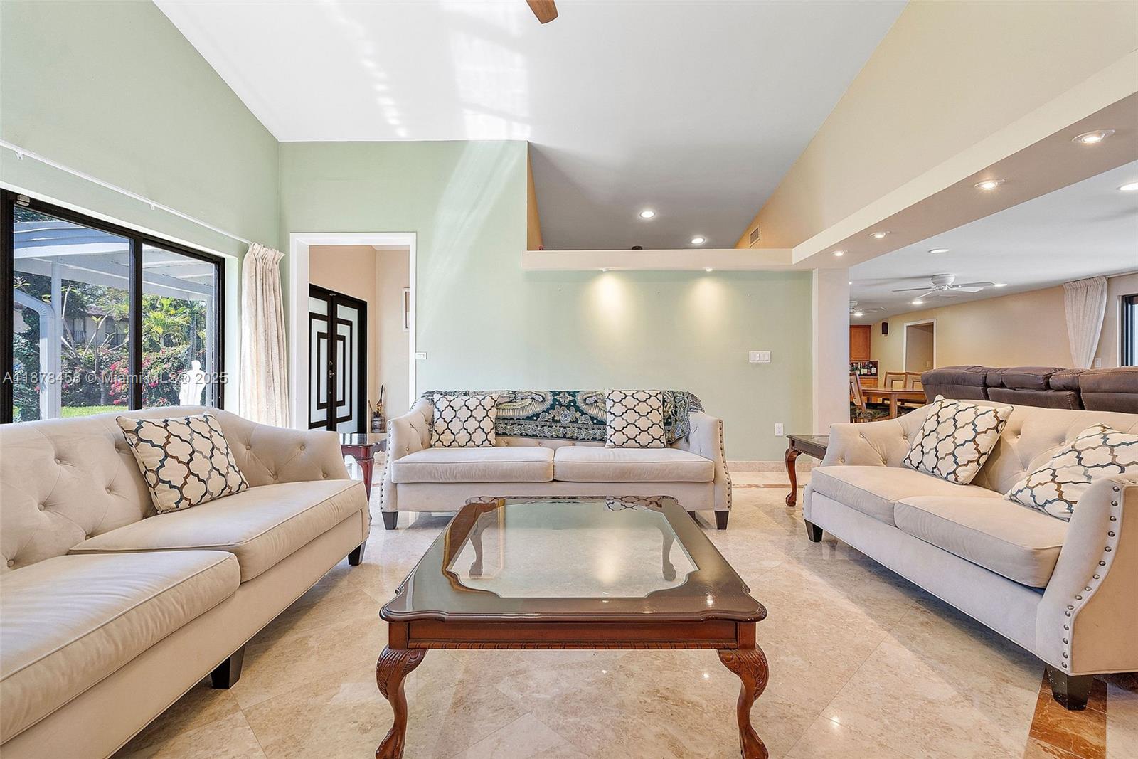 2531 Northeast 195th Street Aventura, FL 33180 - Photo 13 of 45 a living room with furniture and a large window