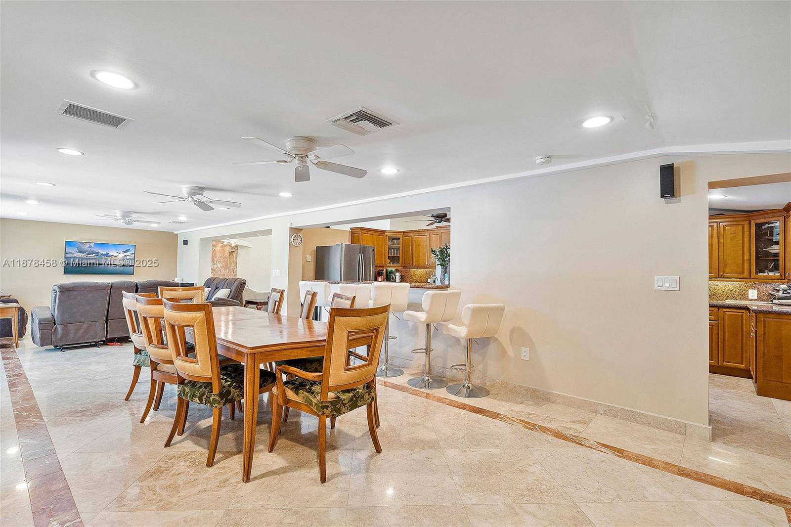 2531 Northeast 195th Street Aventura, FL 33180 - Photo 29 of 45 a view of a dining room with furniture