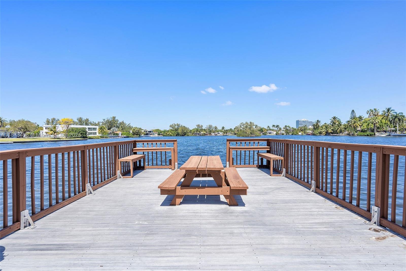 2531 Northeast 195th Street Aventura, FL 33180 - Photo 38 of 45 a roof deck with a table and chairs