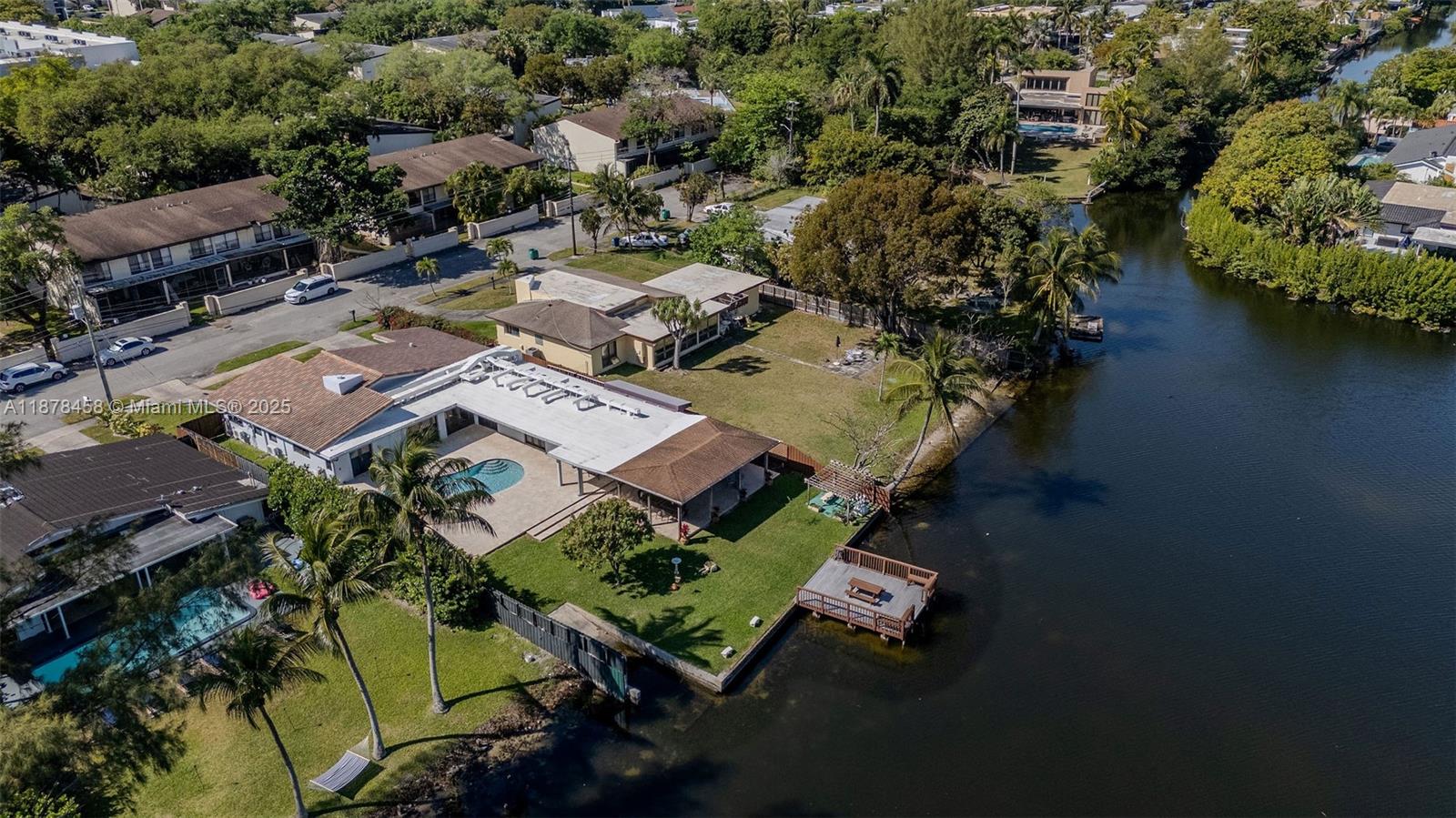 2531 Northeast 195th Street Aventura, FL 33180 - Photo 44 of 45 an aerial view of a house with a garden and lake view
