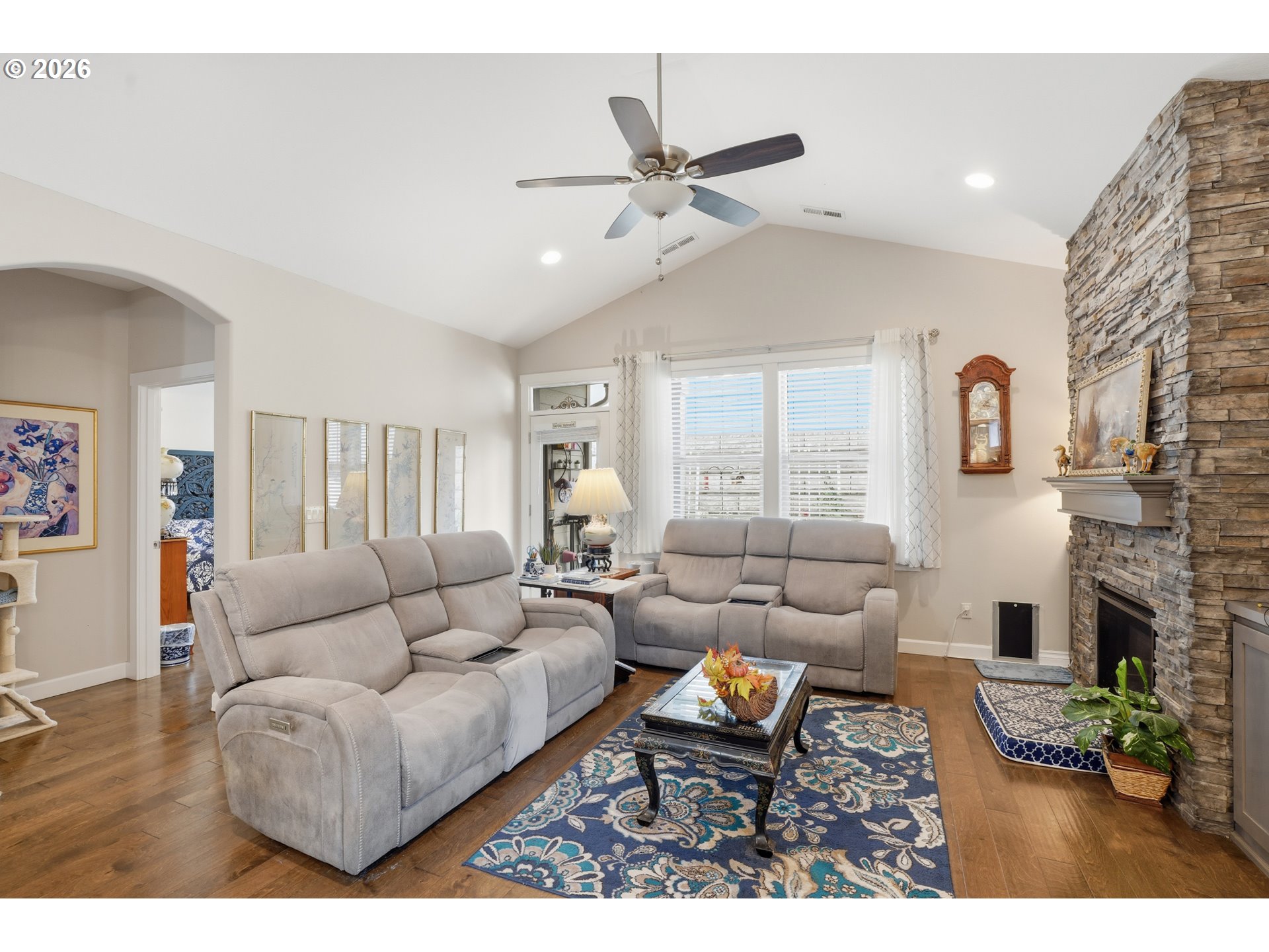 17314 Northeast 17th Avenue Ridgefield, WA 98642 - Photo 11 of 25 a living room with furniture and a fireplace