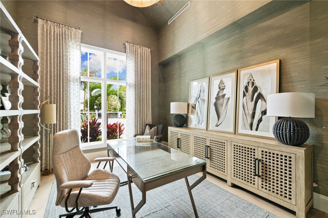 39 Cajeput Drive Naples, FL 34108 - Photo 13 of 50 a living room with furniture