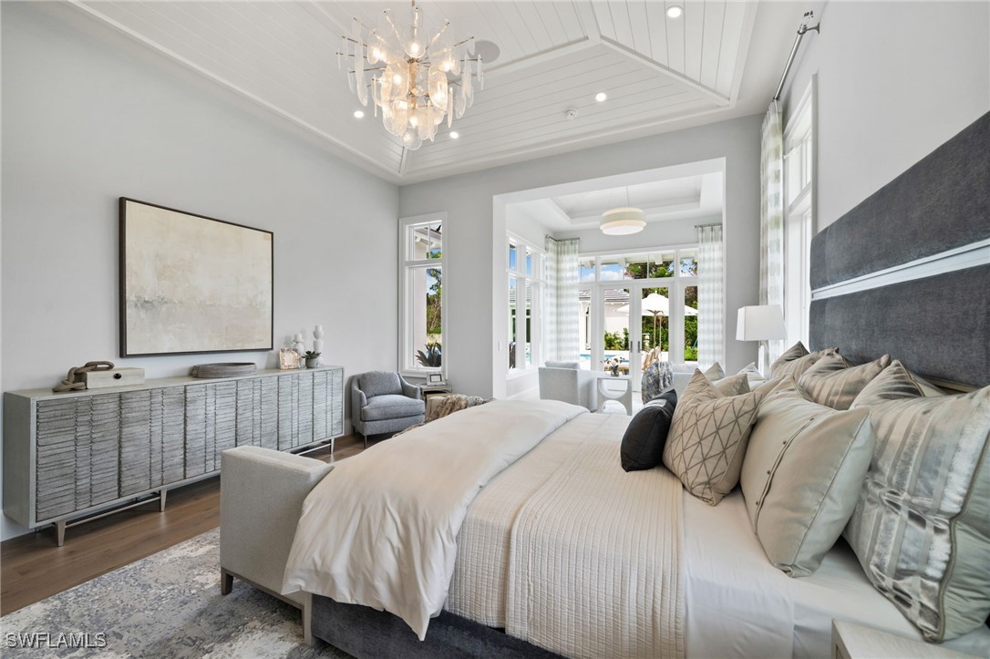 39 Cajeput Drive Naples, FL 34108 - Photo 20 of 50 a bedroom with bed and window