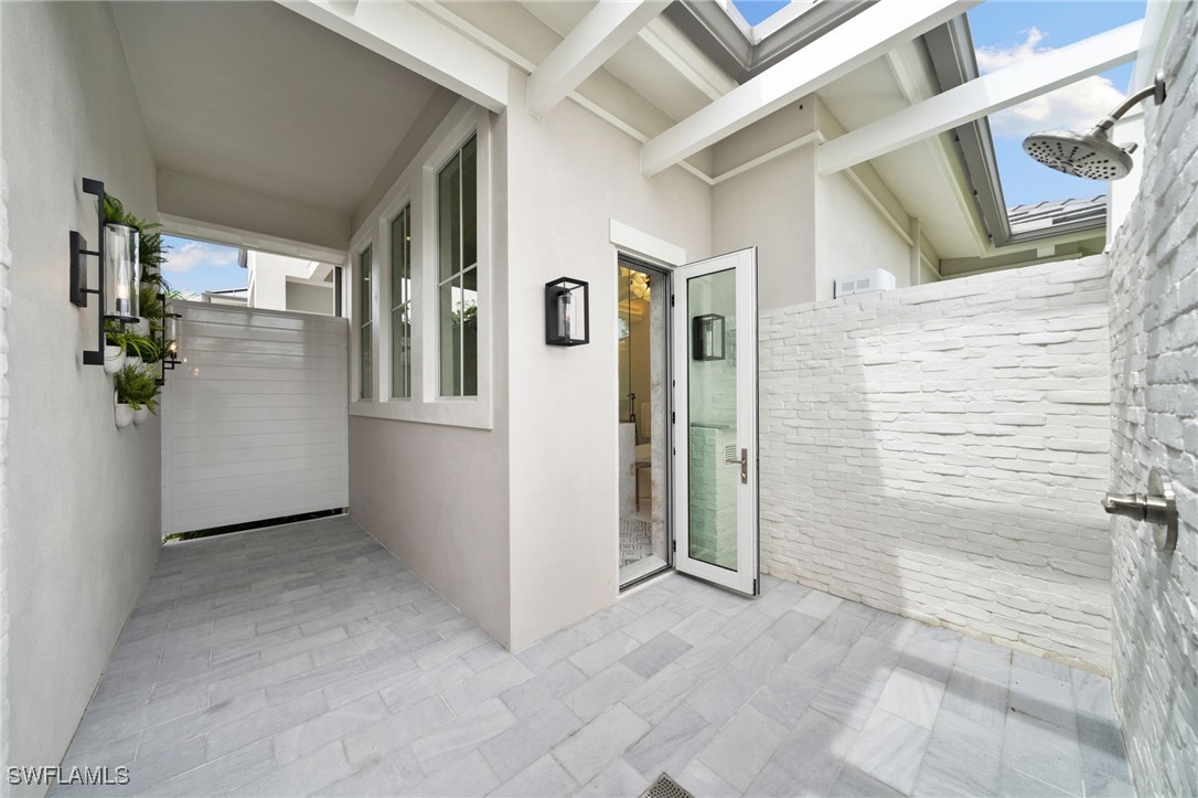 39 Cajeput Drive Naples, FL 34108 - Photo 24 of 50 a view of an entryway