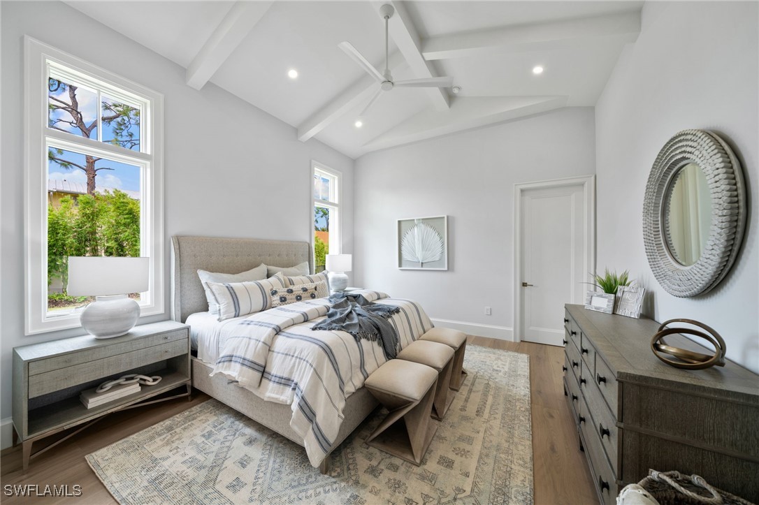 39 Cajeput Drive Naples, FL 34108 - Photo 31 of 50 a bedroom with furniture and a window