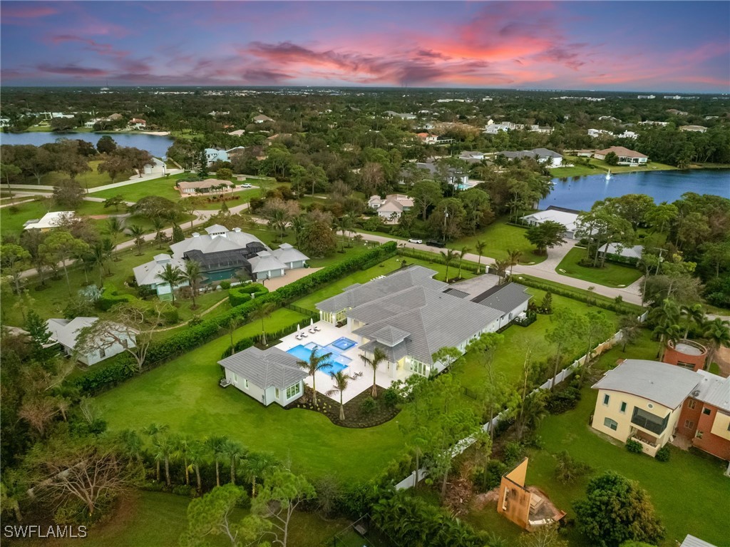 39 Cajeput Drive Naples, FL 34108 - Photo 50 of 50 an aerial view of a house with a yard basket ball court and outdoor view
