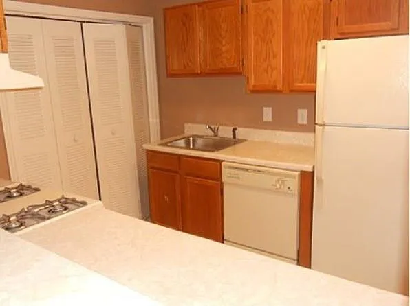 a view of backyard with green space