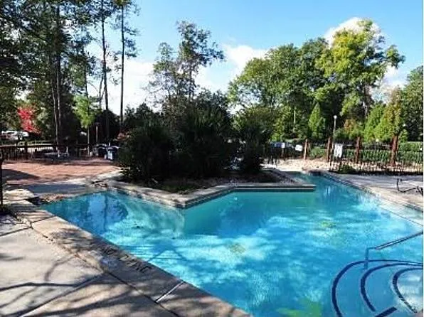 a view of a house with swimming pool