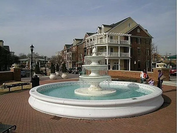 a kitchen with a stove and a refrigerator