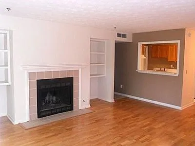 an empty room with a empty space and window