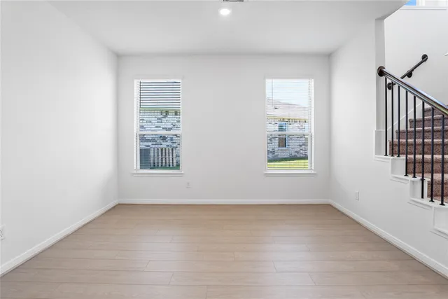 an empty room with windows