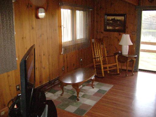 7872 Baylis Road Kinmundy, IL 62854 - Photo 10 of 16 a view of a livingroom with furniture and a window