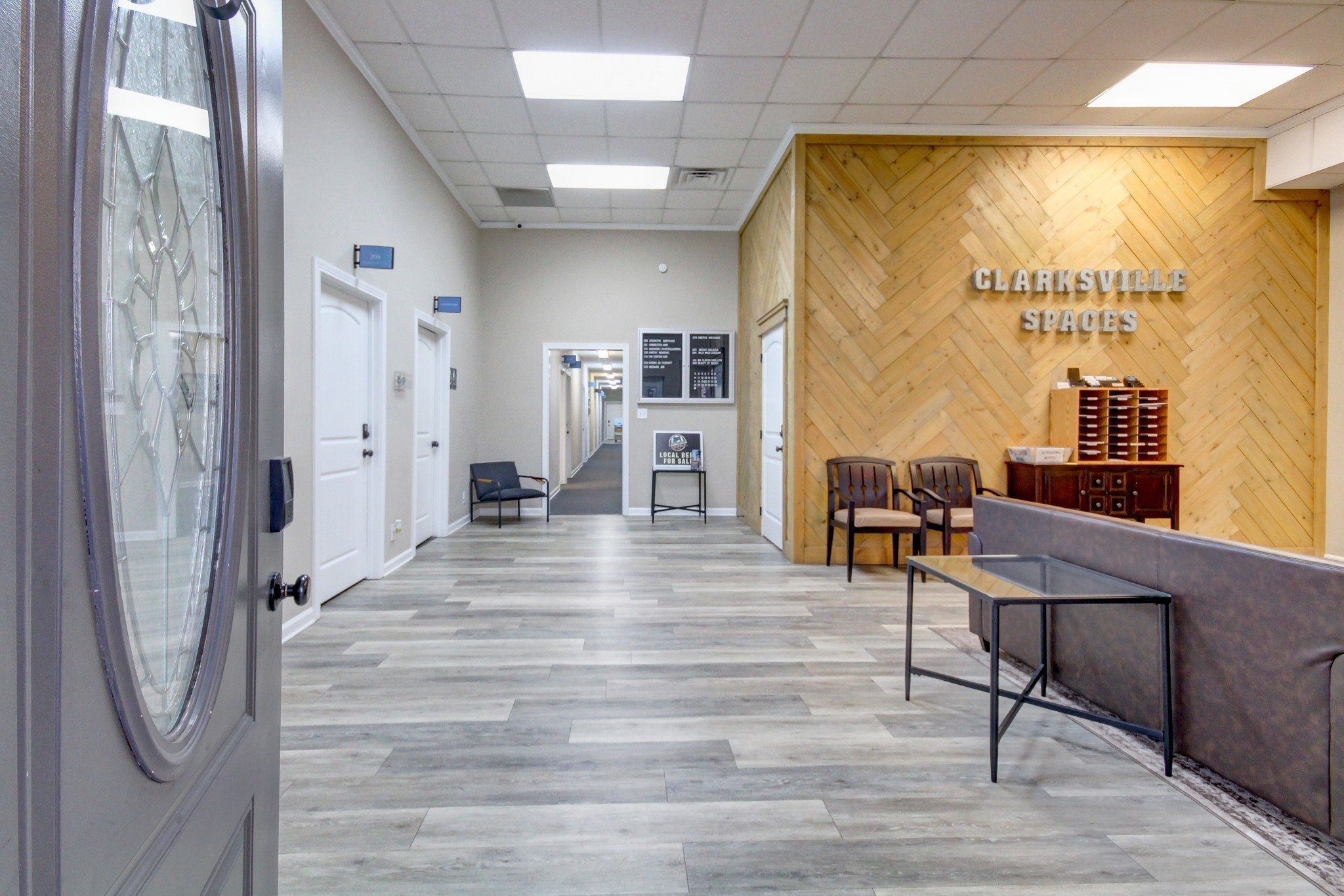 1017 South Riverside Drive Clarksville, TN 37040 - Photo 3 of 51 a room with a wooden floor and furniture