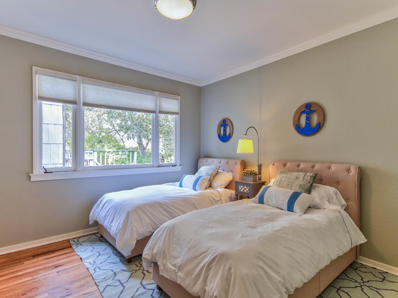 3 11th Avenue Carmel, CA 93923 - Photo 14 of 26 a bedroom with 2 bed and a window