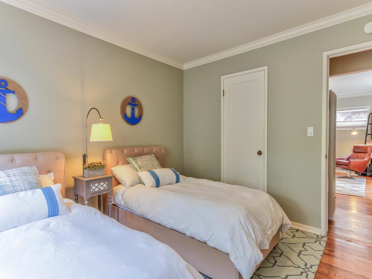 3 11th Avenue Carmel, CA 93923 - Photo 15 of 26 a bedroom with bed and a window