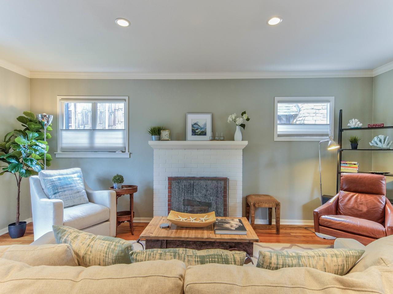 3 11th Avenue Carmel, CA 93923 - Photo 4 of 26 a living room with furniture and a fireplace