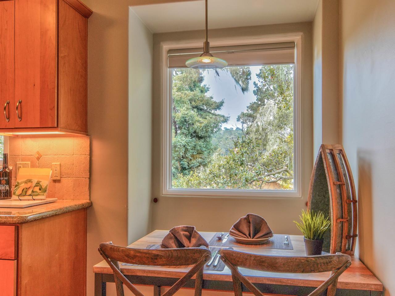 3 11th Avenue Carmel, CA 93923 - Photo 9 of 26 a view of a dining room with furniture window and outside view