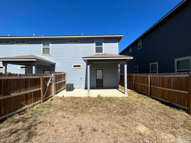 a front view of a house with wooden floor