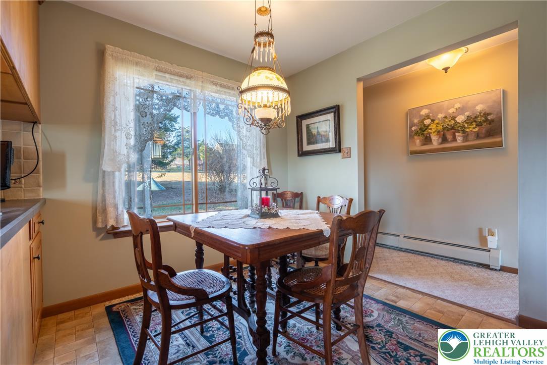 77 Uhlerstown Hill Road Erwinna, PA 18920 - Photo 20 of 47 a view of a dining room with furniture window and outside view
