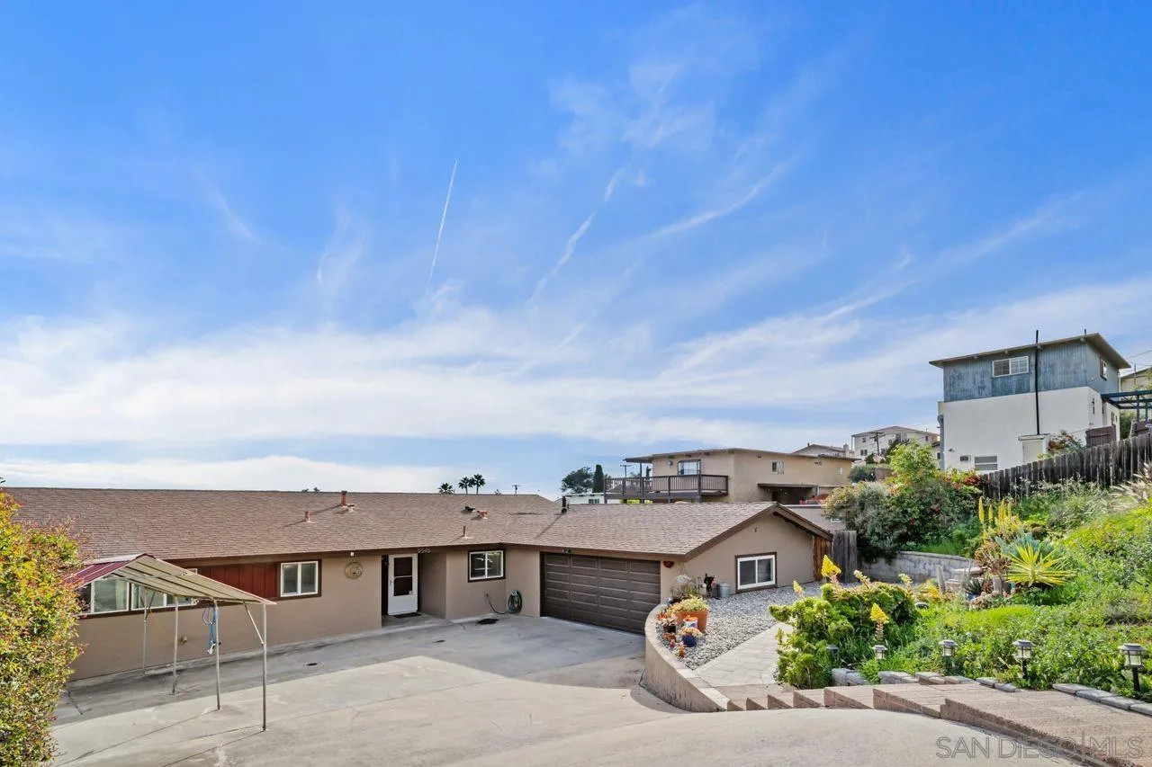 9545 Chestnut Street Spring Valley, CA 91977 - Photo 1 of 32 an aerial view of residential houses with outdoor space