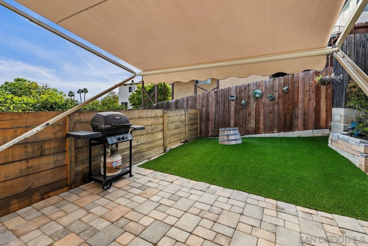 9545 Chestnut Street Spring Valley, CA 91977 - Photo 13 of 32 a view of a backyard with sitting area