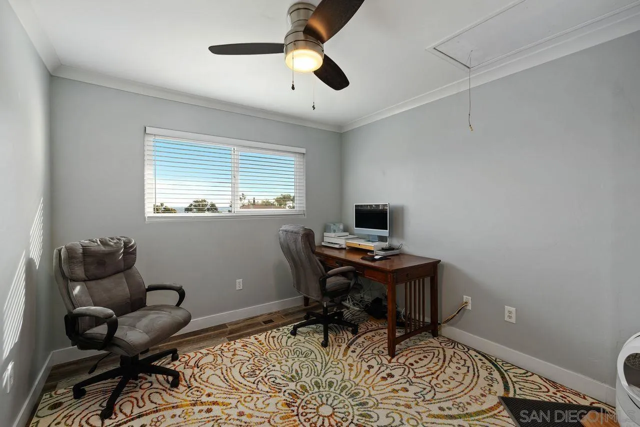 9545 Chestnut Street Spring Valley, CA 91977 - Photo 18 of 32 a workspace with furniture