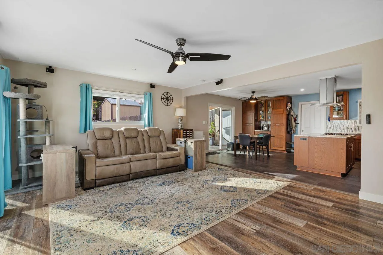9545 Chestnut Street Spring Valley, CA 91977 - Photo 7 of 32 a living room with furniture and a wooden floor