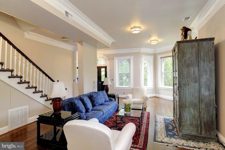 1219 Q Street Northwest Washington, DC 20009 - Photo 2 of 25 a living room with furniture and a window