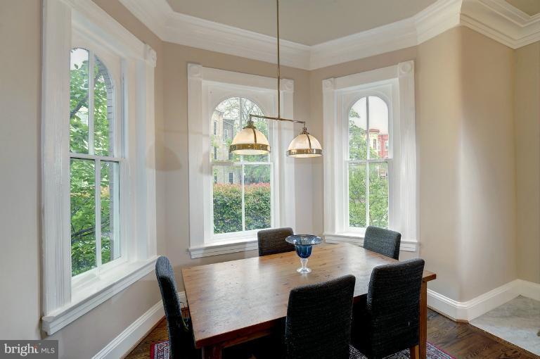 1219 Q Street Northwest Washington, DC 20009 - Photo 12 of 25 a view of a dining room with furniture window and outside view