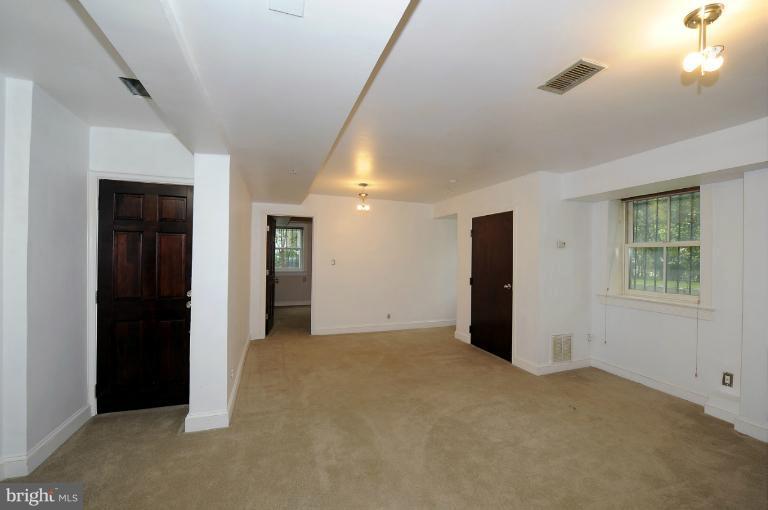 1219 Q Street Northwest Washington, DC 20009 - Photo 15 of 25 an empty room with windows and closet