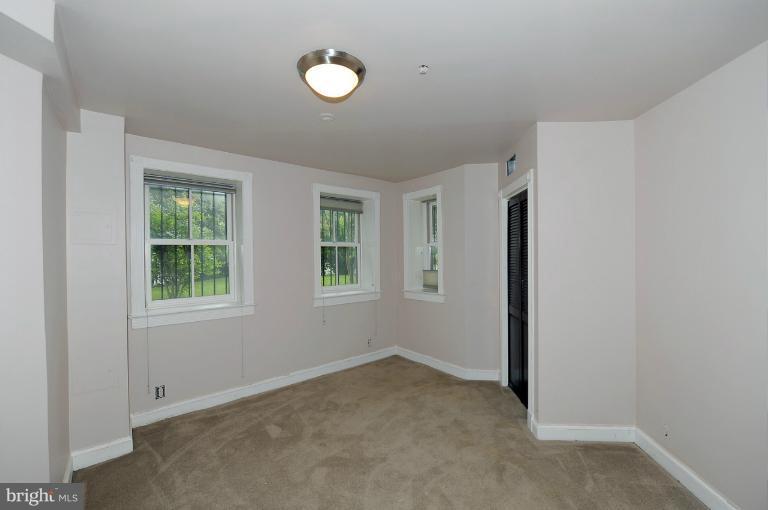 1219 Q Street Northwest Washington, DC 20009 - Photo 25 of 25 an empty room with windows