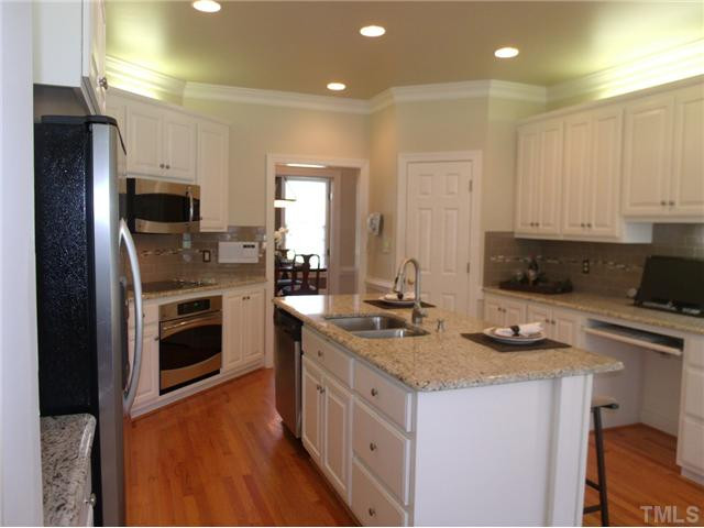 604 Mason Road Durham, NC 27712 - Photo 5 of 25 Updated stainless steel appliances. Deep stainless steel sink in center island. Kitchen