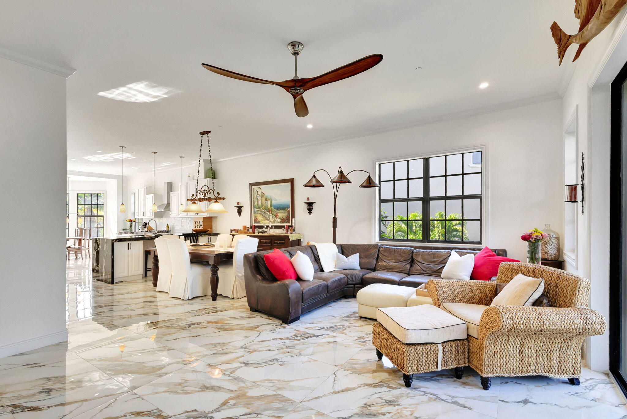 301 Del Sol Circle Tequesta, FL 33469 - Photo 27 of 83 a living room with furniture and kitchen view