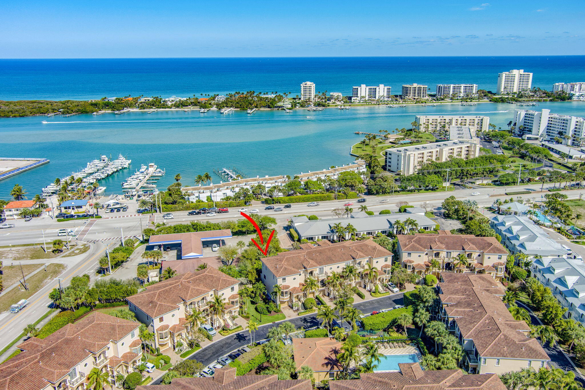 301 Del Sol Circle Tequesta, FL 33469 - Photo 66 of 83 an aerial view of ocean and residential houses with outdoor space
