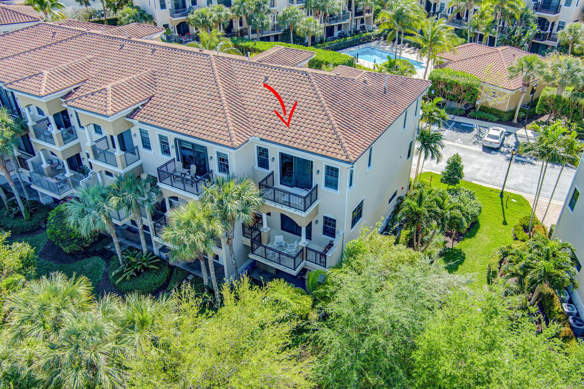 301 Del Sol Circle Tequesta, FL 33469 - Photo 73 of 83 an aerial view of a house with a yard and garden