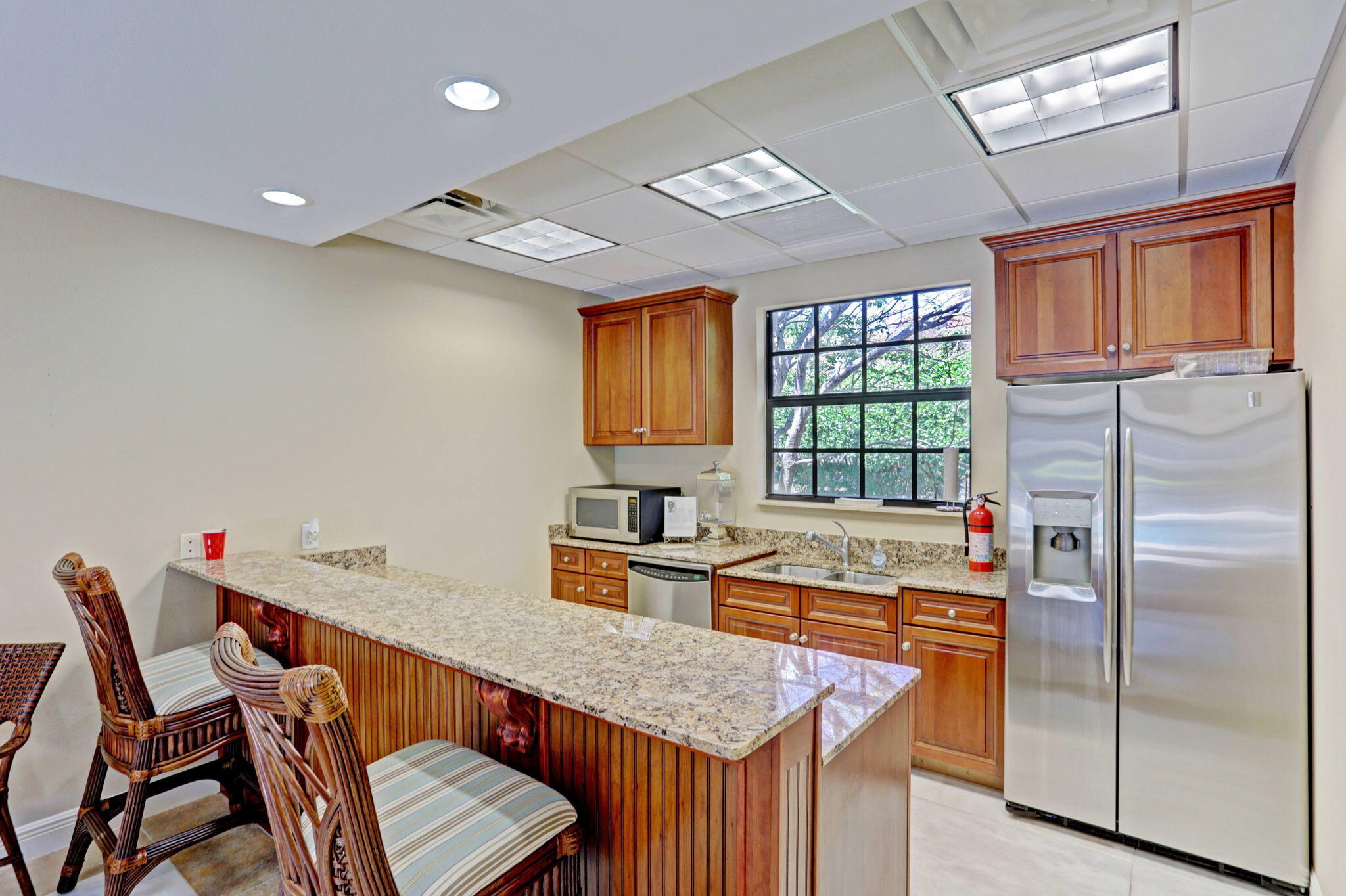 301 Del Sol Circle Tequesta, FL 33469 - Photo 80 of 83 a kitchen that has a cabinets counter space and appliances