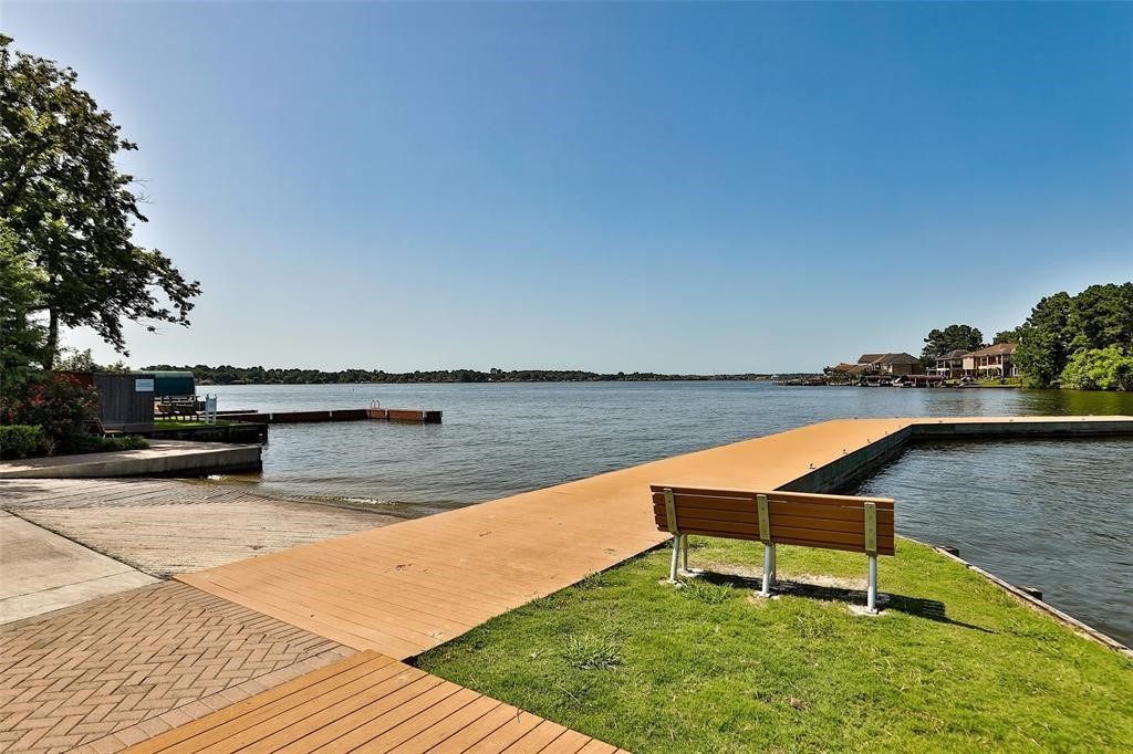 6206 Blue Coast Lane Conroe, TX 77304 - Photo 34 of 43 a view of a swimming pool with a lounge chair