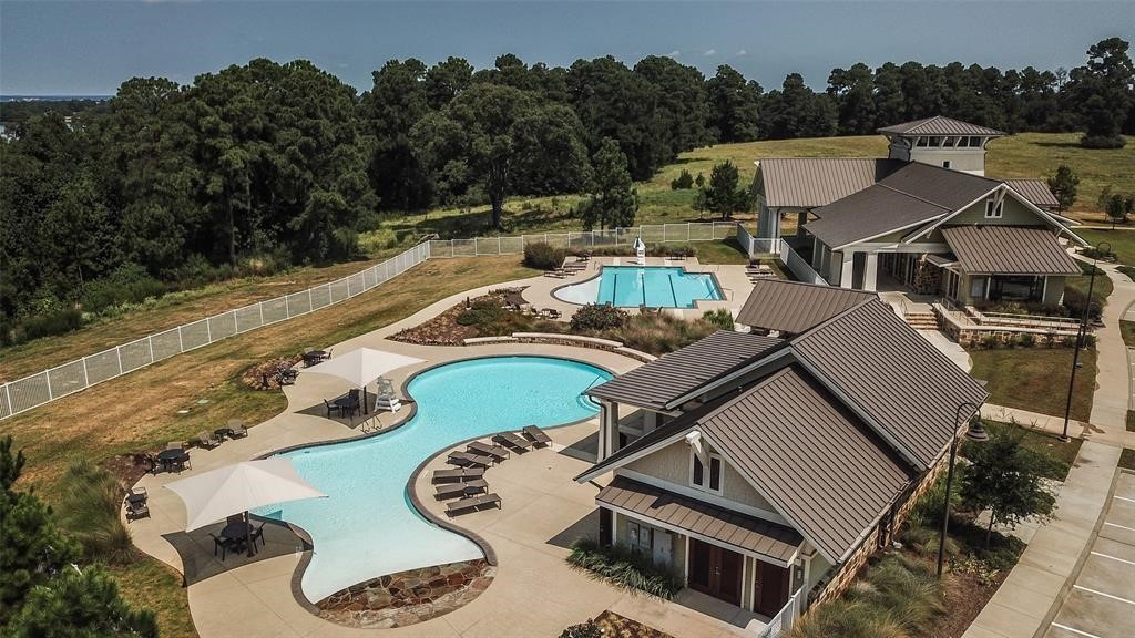 6206 Blue Coast Lane Conroe, TX 77304 - Photo 39 of 43 an aerial view of a house with garden space