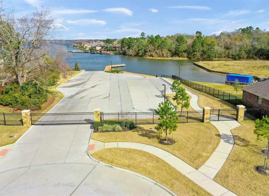 6206 Blue Coast Lane Conroe, TX 77304 - Photo 42 of 43 a view of a swimming pool and outdoor space