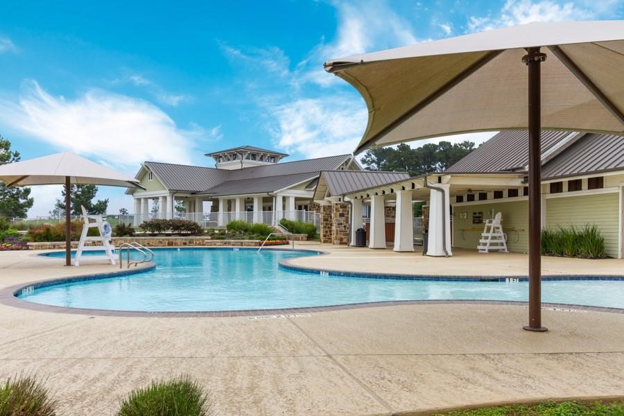 6206 Blue Coast Lane Conroe, TX 77304 - Photo 43 of 43 a front view of a house with swimming pool