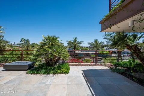a view of yard with outdoor seating and green space
