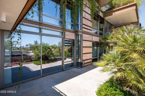 a bench sitting in front of a building