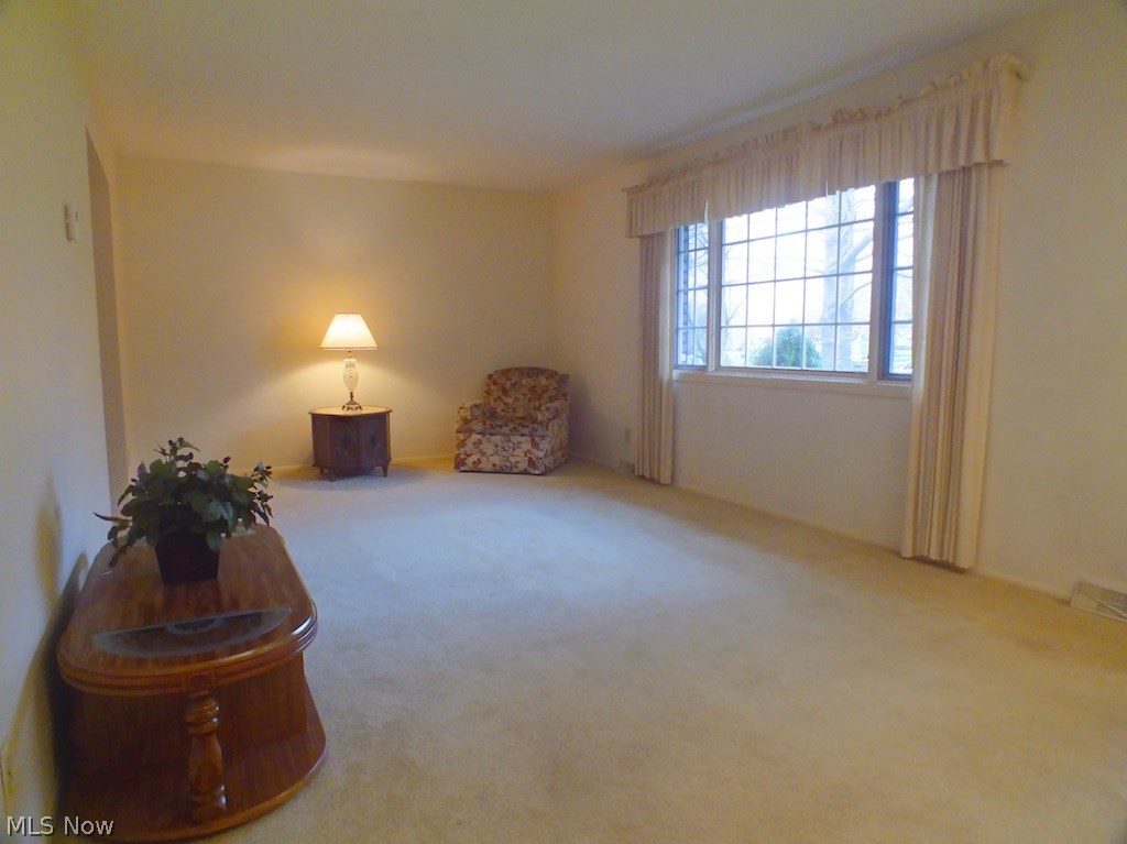1022 Millridge Road Cleveland, OH 44143 - Photo 4 of 23 Spacious Living Room with nice natural northern light through the large picturesque window. to the left, you'll enter into the formal Dining Room.